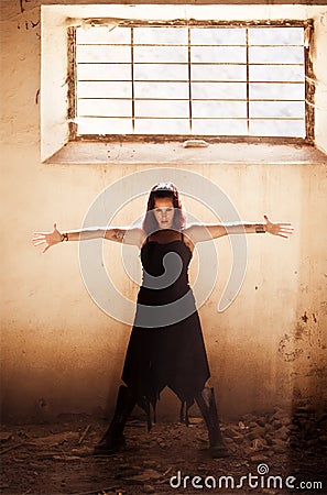 Arms raised gothic girl Stock Photo