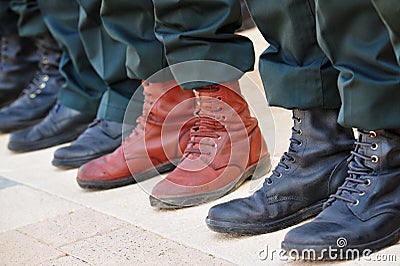 Army Boots Stand Out in a Crowd Stock Photo