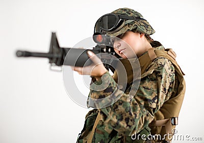 Army girl with gun Stock Photo