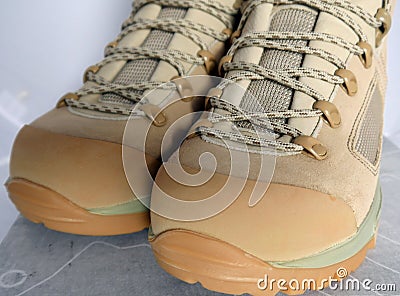 Army hiking alpine boots for adventurous trips Stock Photo