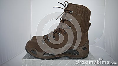 Army hiking alpine boots for adventurous trips Stock Photo