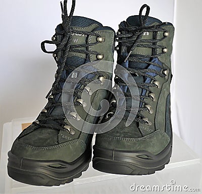 Army hiking alpine boots for adventurous trips Editorial Stock Photo