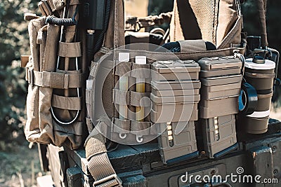 Army vest with a walkie-talkie, charged collars, stun grenades, luminous sticks Stock Photo