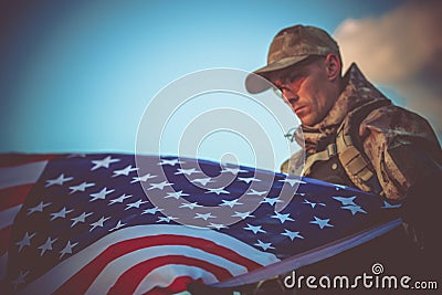 Army Veteran with USA Flag Stock Photo