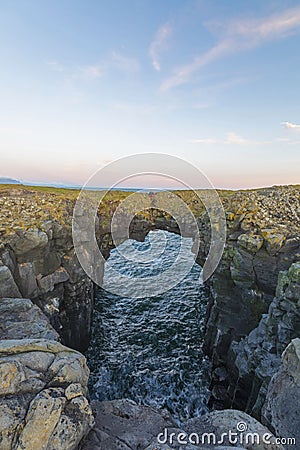 Arnarstapi, Iceland, September 2019, Gatklettur or Hellnar Arch is a famous, naturally formed stone arch Stock Photo