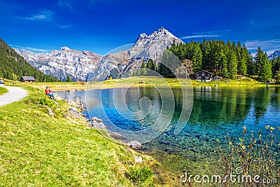 Arnisee with Swiss Alps. Arnisee is a reservoir in the Canton of Uri, Switzerland Editorial Stock Photo