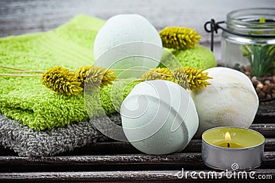 Aroma bath bombs, green towels Stock Photo