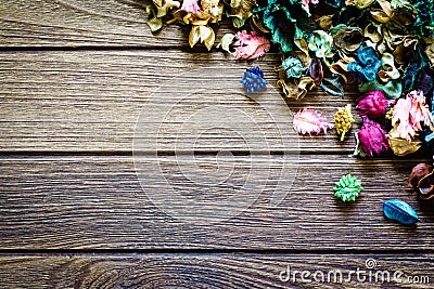 Aromatherapy potpourri mix of dried aromatic flowers on wooden background Stock Photo