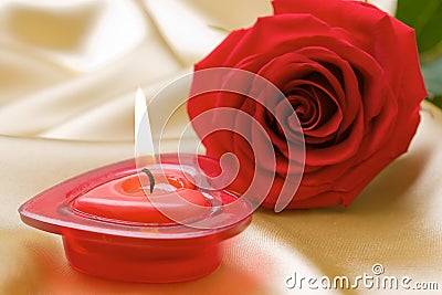 Aromatic candle and red rose Stock Photo