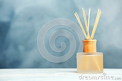 Aromatic reed freshener on table Stock Photo