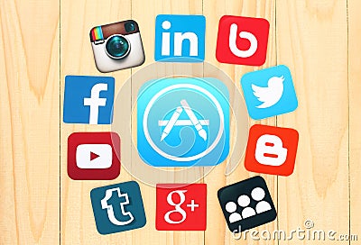 Around AppStore icon are placed famous social media icons Editorial Stock Photo