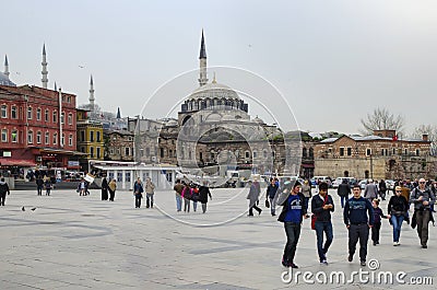 Around the buildings the historic mosque and the people traveling Editorial Stock Photo