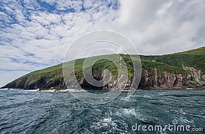 Around the Iveragh Peninsula, cruise along the cliffs in sunny day, Kerry coastline, Ireland Stock Photo