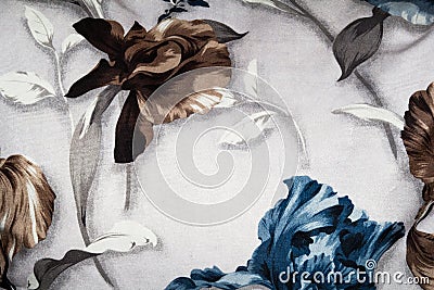 arrangement of blue brown flowers on fabric background Stock Photo