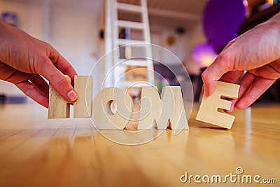 New Home: Arranging HOME letters Stock Photo