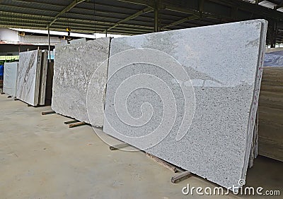 An array of newly arrived natural stones in a warehouse Stock Photo