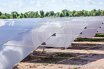 Array of thin film solar cells or amorphous silicon solar cells or photovoltaics in solar power plant Stock Photo