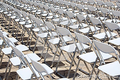 Array of White Chairs Stock Photo