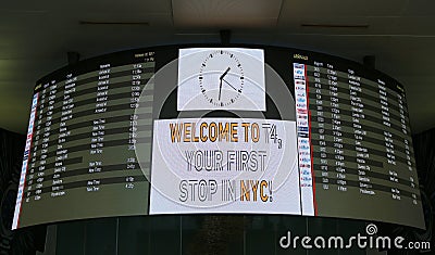 Arrival board inside of Delta Airline Terminal 4 at JFK International Airport in New York Editorial Stock Photo