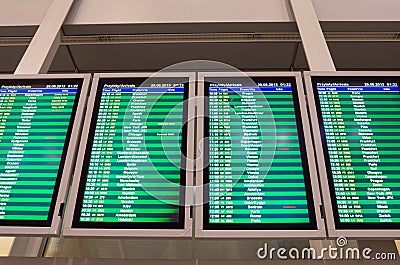 Arrivals board in Warsaw airport Stock Photo