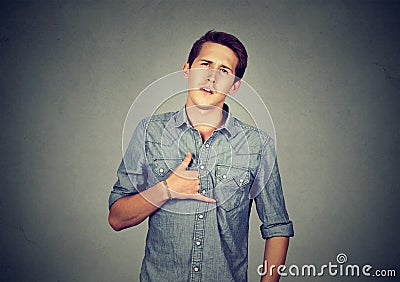 Arrogant bold self important stuck up man with napoleon complex Stock Photo