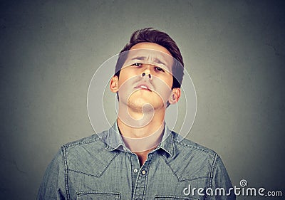 Arrogant bold self important stuck up man with napoleon complex Stock Photo