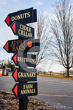 Arrow Direction Sign at Apple Orchard Editorial Stock Photo