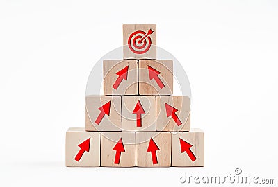 Arrow icons and target icon on wooden cubes. Financial growth, goal achievement or career development concept in business Stock Photo