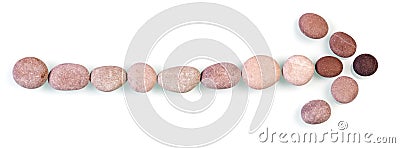 Arrow made with pebble stones Stock Photo