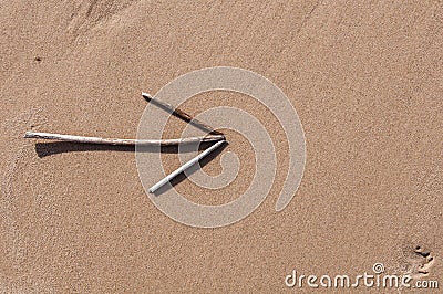 The arrow on the sand Stock Photo