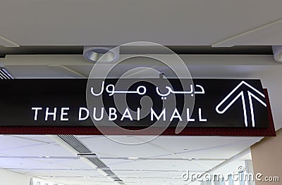 Arrow sign pointing direction toThe Dubai Mall Editorial Stock Photo