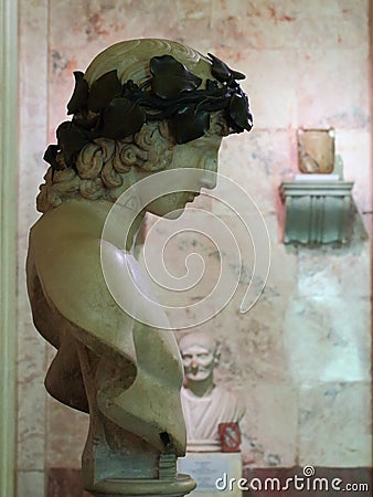 Art of Ancient Rome. Antinous in the image of Dionysus with a bronze wreath Editorial Stock Photo