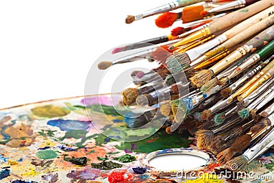 Art brushes on artist palette Stock Photo