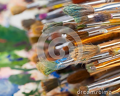 Art brushes and artist palette Stock Photo