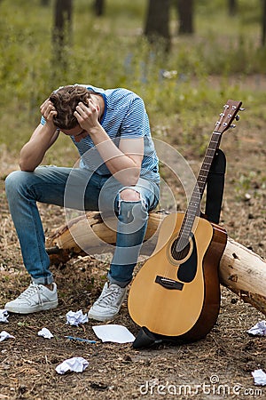 Art complication guitar nature man concept. Stock Photo