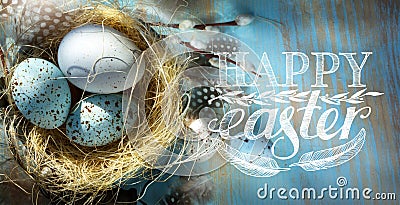 Art Happy Easter; Easter eggs in basket on the blue table backgrou Stock Photo