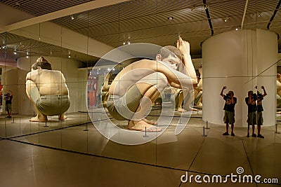 Art installation of Ron Mueck at the ARoS art museum of Aarhus on Denmark Editorial Stock Photo