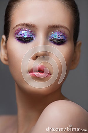 Art makeup many sequins and rhinestones of different shapes Stock Photo