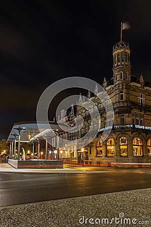 Art Nouveau Amrath Grand hotel L`Empereur next to a modern underground bike parking in downtown Maastrich Editorial Stock Photo