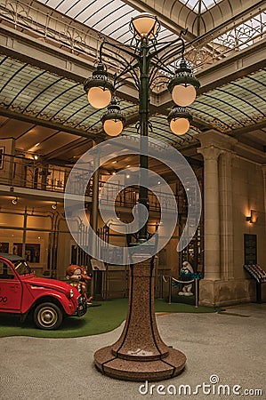 Art Nouveau lamp and glass ceiling in an old building, at Brussels. Editorial Stock Photo