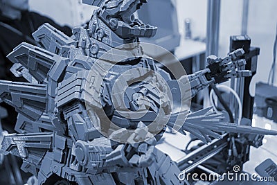 Art object printed 3D printer. Detail element robot toy created 3D printer. Stock Photo