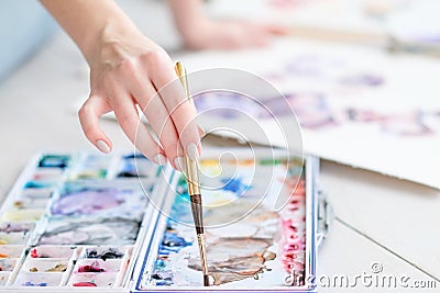 Art painting class hobby hand mixing watercolors Stock Photo