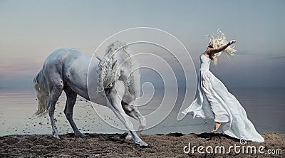 Art photo of the woman with strong horse Stock Photo