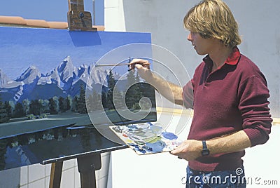 An art student painting a scenic, Editorial Stock Photo