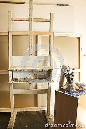 Art Studio with an Easel and Blank Canvases Stock Photo