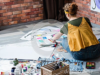 Art therapy lady painting abstract artworks Stock Photo