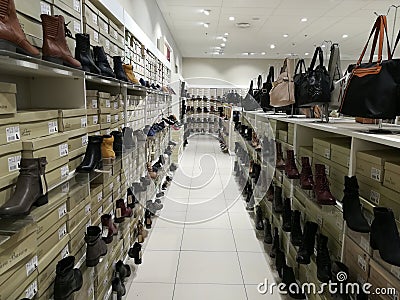 Articles for women - handbags and boots Editorial Stock Photo