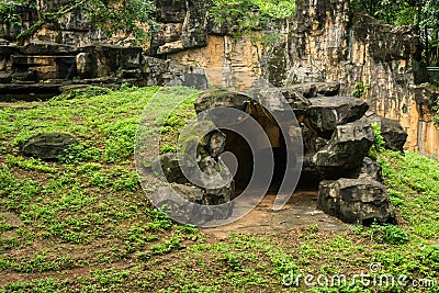 An artificial cave made from cement with hill and cliff photo taken in Jakarta Indonesia Stock Photo