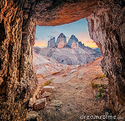 Artificial cave in the mountain range on front of Tre Cime Di Lavaredo peaks. Stock Photo