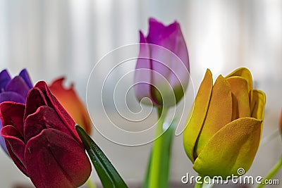 Artificial flowers. Interior design. decoration for rooms. Stock Photo